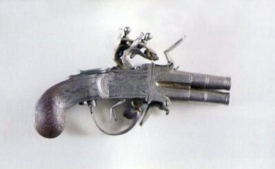 Pistolet à coffre à silex avec bloc tournant de quatre canons